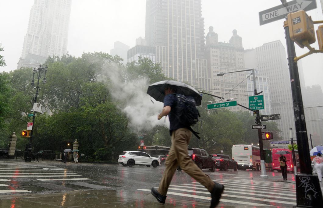 New York declares state of emergency as flash floods submerge Queens ...