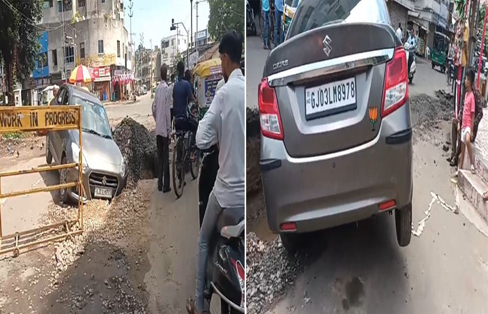 વડોદરા શહેરના જયરત્ન ચારરસ્તા પાસે કોર્પોરેશને ખોદેલા ખાડામાં કાર ફસાઈ
