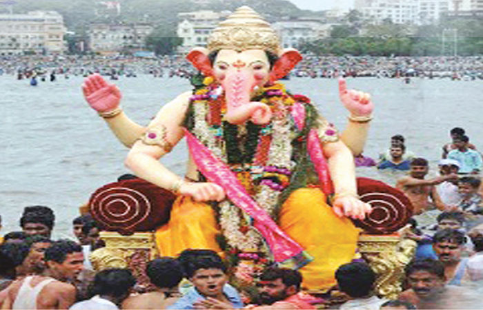"गणपती बाप्पा मोरया, पुढच्या वर्षी लवकर या ।"