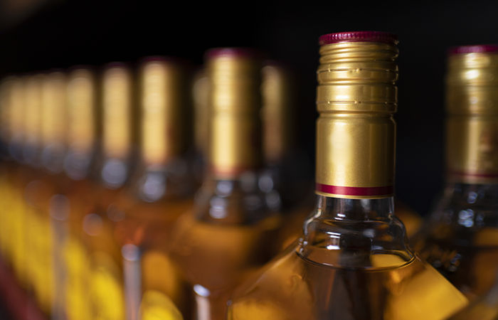 Eight held, four absconding in alcoholic syrup nexus busted from Dwarka