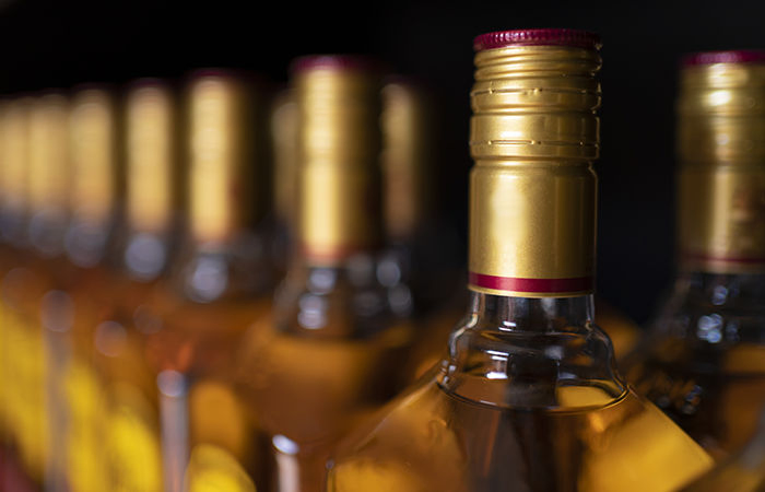 Liquor smuggler dozed off in train, nabbed by police in Vadodara