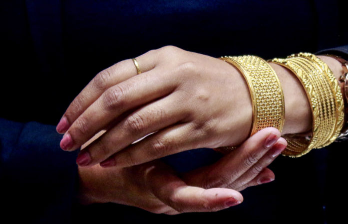 Gold scales record high, silver hits 14-year peak on Fed cut bets