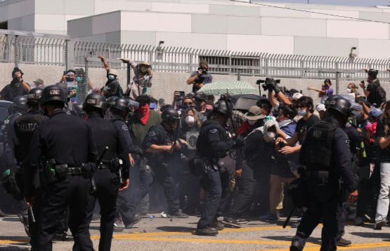 Curfew imposed in downtown LA after protests, looting spark chaos