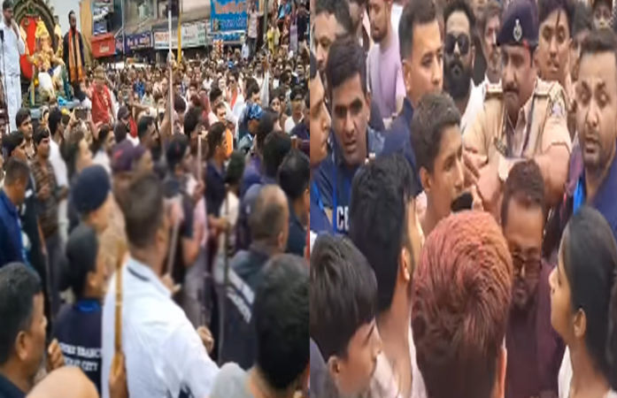 VIDEO: સુરતમાં ગણેશ વિસર્જન દરમિયાન પોલીસ અને મંડળના યુવકો વચ્ચે ઘર્ષણ, હજારોની ભીડ વચ્ચે અફરાતફરી