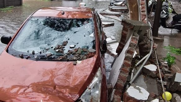 Wall collapse damages six vehicles near Agrawal Tower in Ahmedabad's Jodhpur