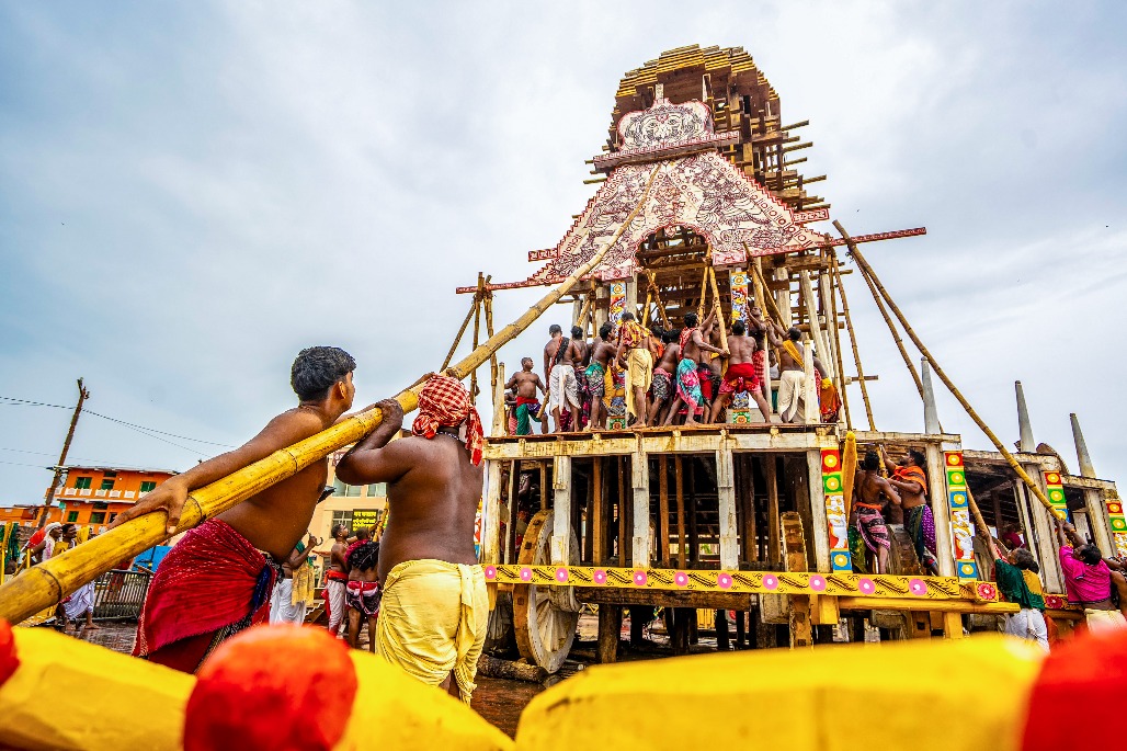4 Traditional Maharana servitors carry out the construction of the three holy chariots — Nandighosha, Taladhwaja and.jpg