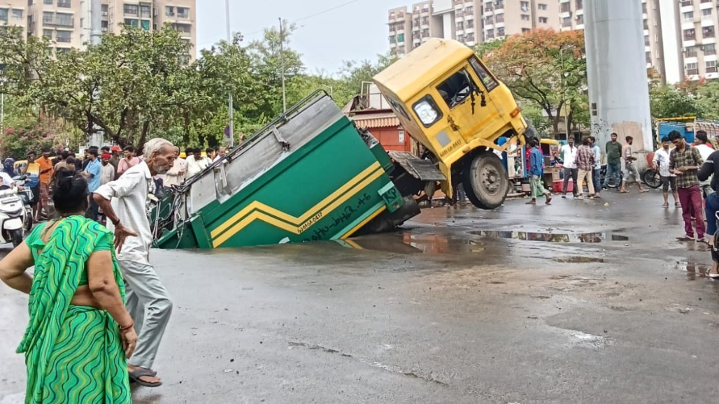 Rain Exposes Civic Gaps as Waterlogging, Road Cave-in Reported Across Ahmedabad