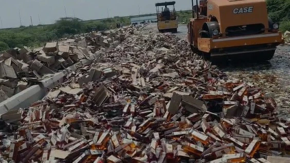 1.72 Lakh Bottles of Seized Liquor Destroyed in Ahmedabad Rural’s Sanand and Aslali