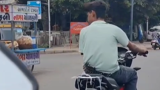 Ahmedabad: Case Against Father After Minor Son Seen Riding Bike With ‘Pistol’ in Viral Video