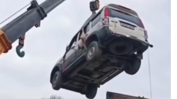 Bihar Man Uses Crane To Park New SUV On Rooftop To Prevent Theft
